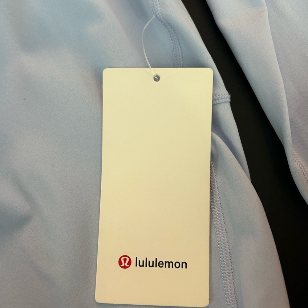 Brand New Lululemon blue active shirt.